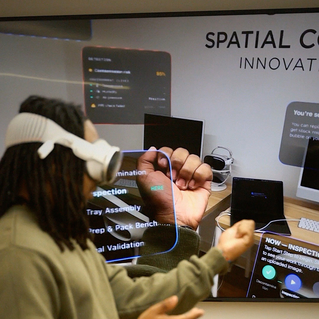 Juan in Apple Vision Pro reaching toward a floating sterile processing checklist.